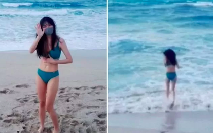 "Chơi trội", nữ streamer bất chấp thời tiết lạnh 3 độ, vẫn mặc bikini đi biển, còn biểu diễn tiết mục “nhảy ùm" xuống nước