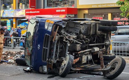 TPHCM: Người dân nâng xe ben, đưa cô gái bị mắc kẹt đi cấp cứu