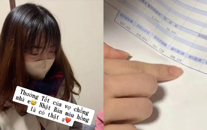 Clip bóc phong bì thưởng Tết 185 triệu đồng của cặp vợ chồng trẻ gây sốt mạng