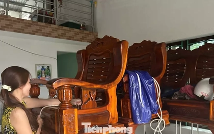 Người dân Đà Nẵng kê cao đồ đạc, đưa ô tô lên cầu, làm chuồng tạm cho trâu để tránh lũ