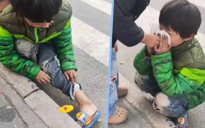 Bé gái Trung Quốc mang dép lê giữa trời lạnh 10 độ C, lom khom nhặt đồ ăn rơi giữa đường khiến dư luận xót xa