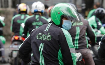 Chạy Grab, Gojek được 200k/ngày mà mỗi cuốc xe bị "cắt máu" đến 20%: Làm nghề này ở đây là khổ hay sướng?
