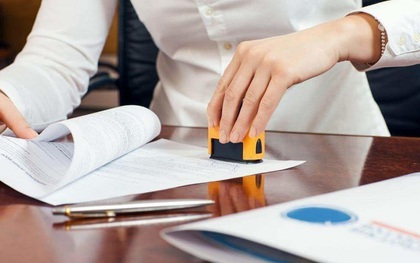 Từ ngày 1/7, người đi công chứng sẽ phải chụp ảnh cùng công chứng viên