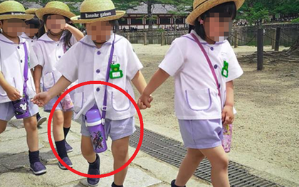 Đeo bình nước bên người, bé trai phải cắt bỏ tụy và lá lách