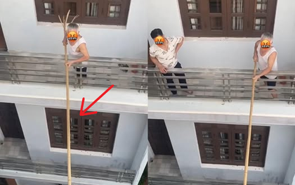 Người đàn ông dùng gậy dài ngăn hàng xóm mở cửa, khi biết nguyên nhân netizen lập tức "quay xe"