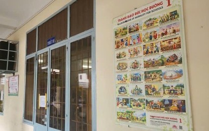 Yêu cầu trường tiểu học gỡ tranh đạo đức dán tường dạy về nhân quả