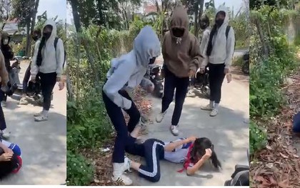 Phẫn nộ clip nữ sinh lớp 8 bị đánh hội đồng: 5 học sinh rượt đuổi, túm tóc kéo giật bạn giữa đường