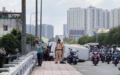 Lật xe trên cầu An Lạc, nam tài xế ở TP.HCM bất ngờ nhảy xuống kênh rồi đòi đánh người cứu