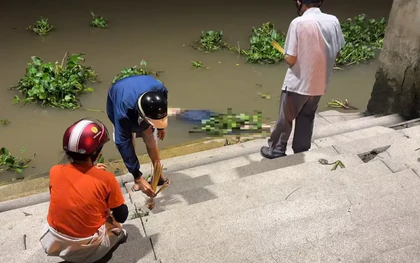 Hai thi thể dạt vào bờ sông Sài Gòn, một người mang theo cục bê tông