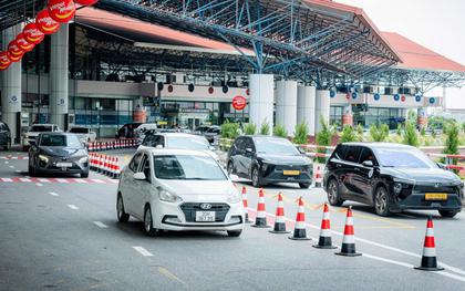 Grab phát thông báo quan trọng về vị trí đón, giá cước mới đến toàn bộ khách hàng đặt xe tại sân bay Nội Bài