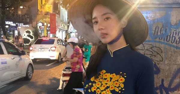 Bạn gái cũ tai tiếng của T.O.P khiến fan Việt phẫn nộ vì vừa mặc áo dài vừa tạo dáng phì phèo thuốc lá