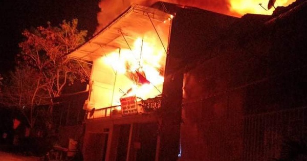 The wooden house was on fire, the couple and their sleeping child got up to escape