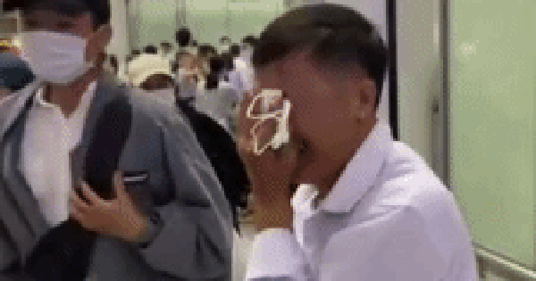 Vietnamese father sobs as he sees his daughter off to get married at the airport