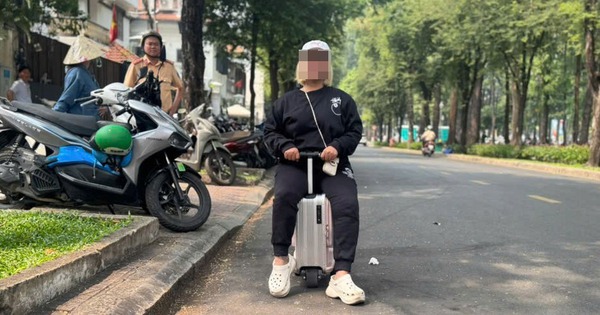 Xử lý người phụ nữ cưỡi vali ở trung tâm quận 1