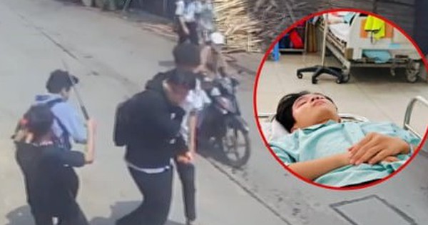 Nam sinh bị nhóm thanh thiếu niên dùng hung khí đánh tới tấp, ngã gục giữa đường