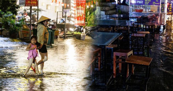 Mưa lớn "đánh úp" Sài Gòn: Người dân bì bõm lội trên đường, quán xá ngập trong nước