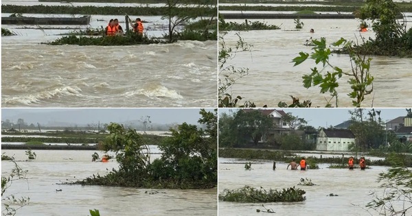 Người đàn ông mắc kẹt giữa dòng nước lũ cuồn cuộn
