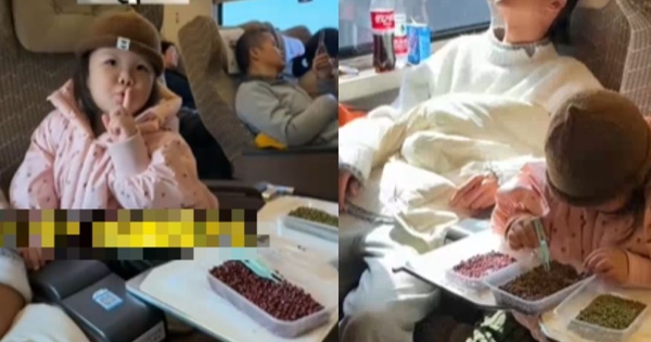 Hình ảnh ông bố và con gái trên chuyến tàu đông đúc gây sốt: Nhìn đồ vật phía dưới bàn, phải khen dạy con sao mà khéo thế!