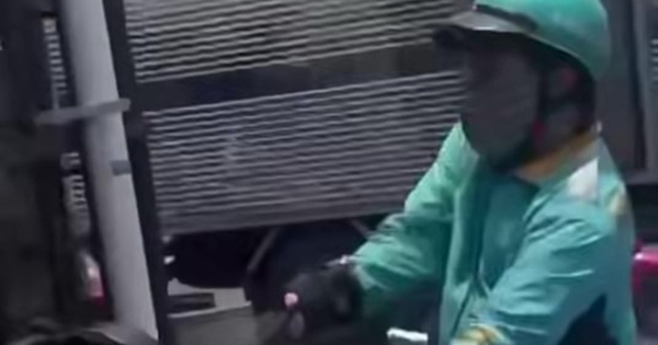 Công an đang lấy lời khai nam tài xế xe ôm công nghệ cầm gậy 3 khúc đánh người đi đường giữa giao lộ ở TP.HCM