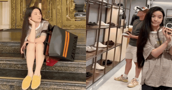 Không còn là CEO sang chảnh, Chu Thanh Huyền mặc áo phông, quần cộc, ngồi bệt trước cửa trung tâm thương mại gây chú ý