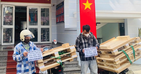 2 thanh niên bị phạt 3 triệu đồng vì vứt rác bừa bãi trên đường Nguyễn Văn Linh